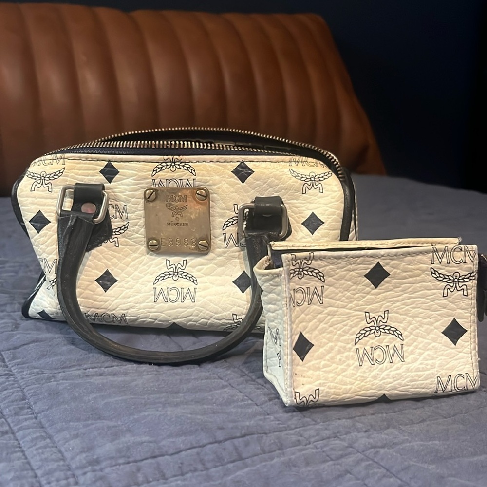 Authentic vintage MCM mini satchel with matching coin purse. Super cute.